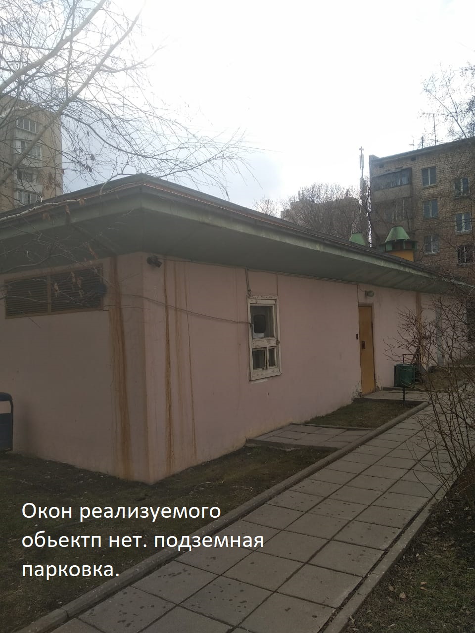 ГП16824607.Машино-место.Фасад здания с выделенными окнами реализуемого объекта.jpg