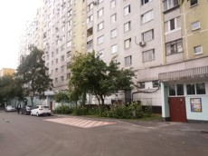 ГП16927592.Нежилое помещение.Фасад здания с выделенными окнами реализуемого объекта.jpg