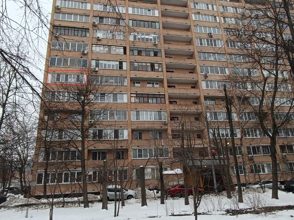 ГП16945556.Квартира.Фасад здания с выделенными окнами реализуемого объекта.jpg