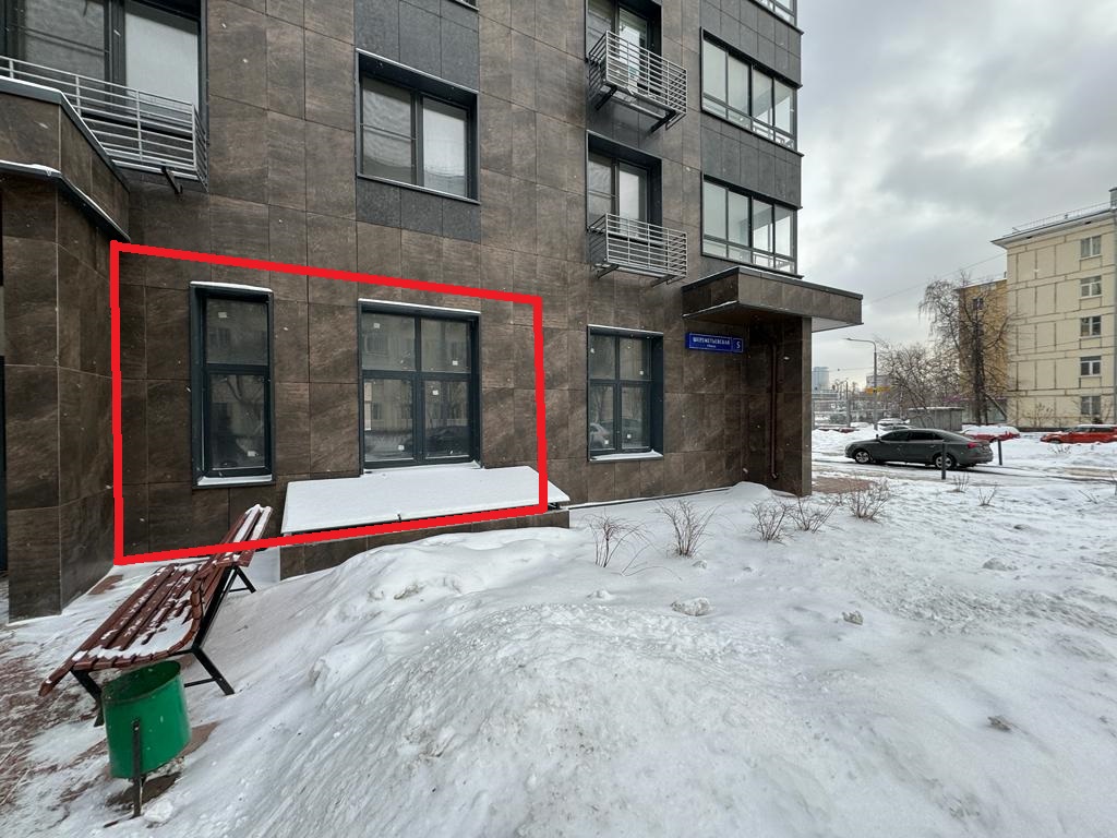 ГП16982476.Нежилое помещение.Фасад здания с выделенными окнами реализуемого объекта.jpg
