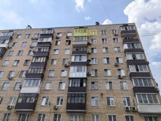 ГП16997139.Квартира.Фасад здания с выделенными окнами реализуемого объекта.jpg