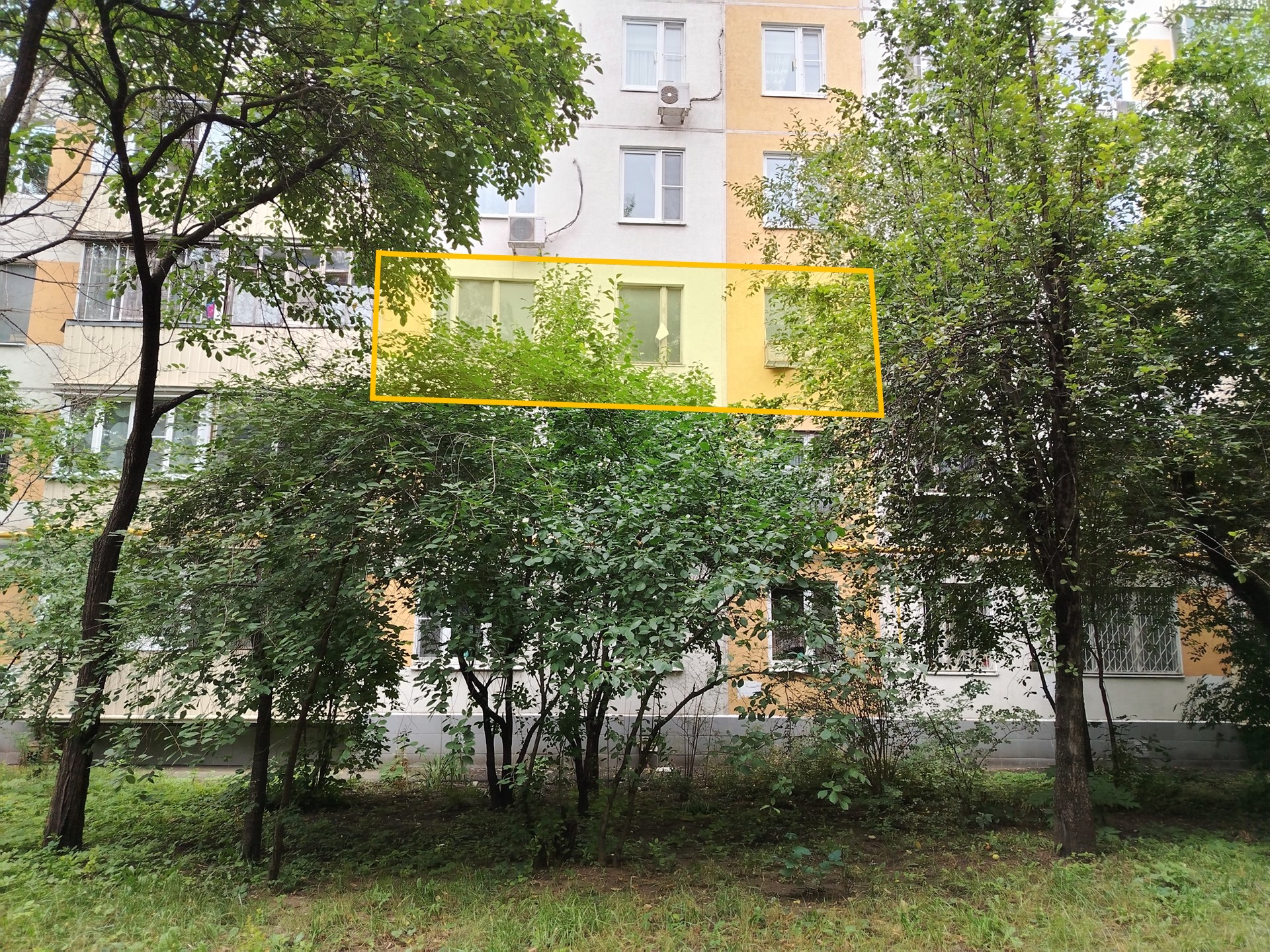 ГП16999373.Квартира.Фасад здания с выделенными окнами реализуемого объекта.jpg
