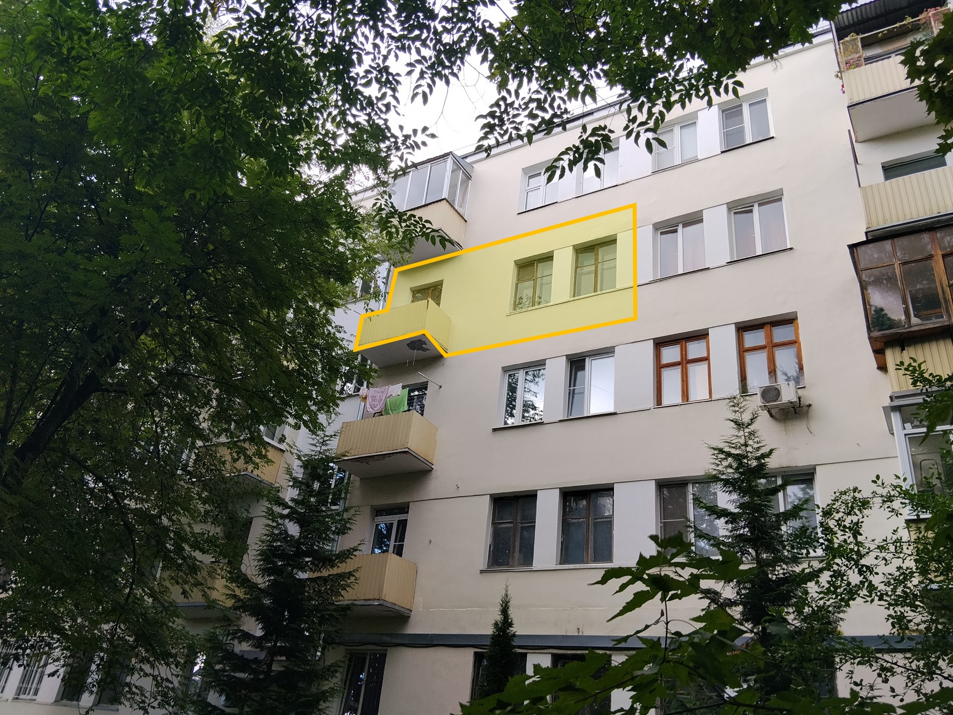 ГП17000882.Квартира.Фасад здания с выделенными окнами реализуемого объекта_2.jpg
