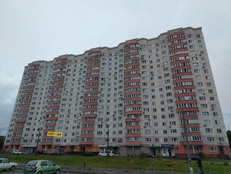 ГП16996113.Квартира.Фасад здания с выделенными окнами реализуемого объекта.jpg