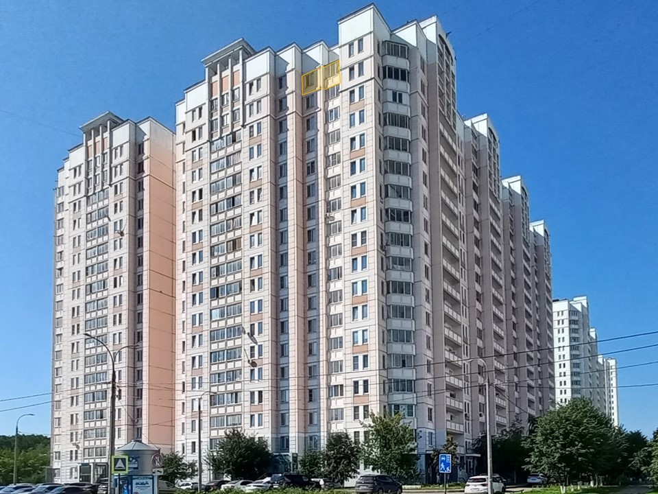 ГП16963821.Квартира.Фасад здания с выделенными окнами реализуемого объекта.jpg