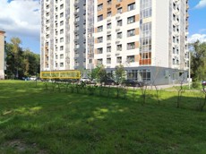 ГП16996556.Нежилое помещение.Фасад здания с выделенными окнами реализуемого объекта.jpg