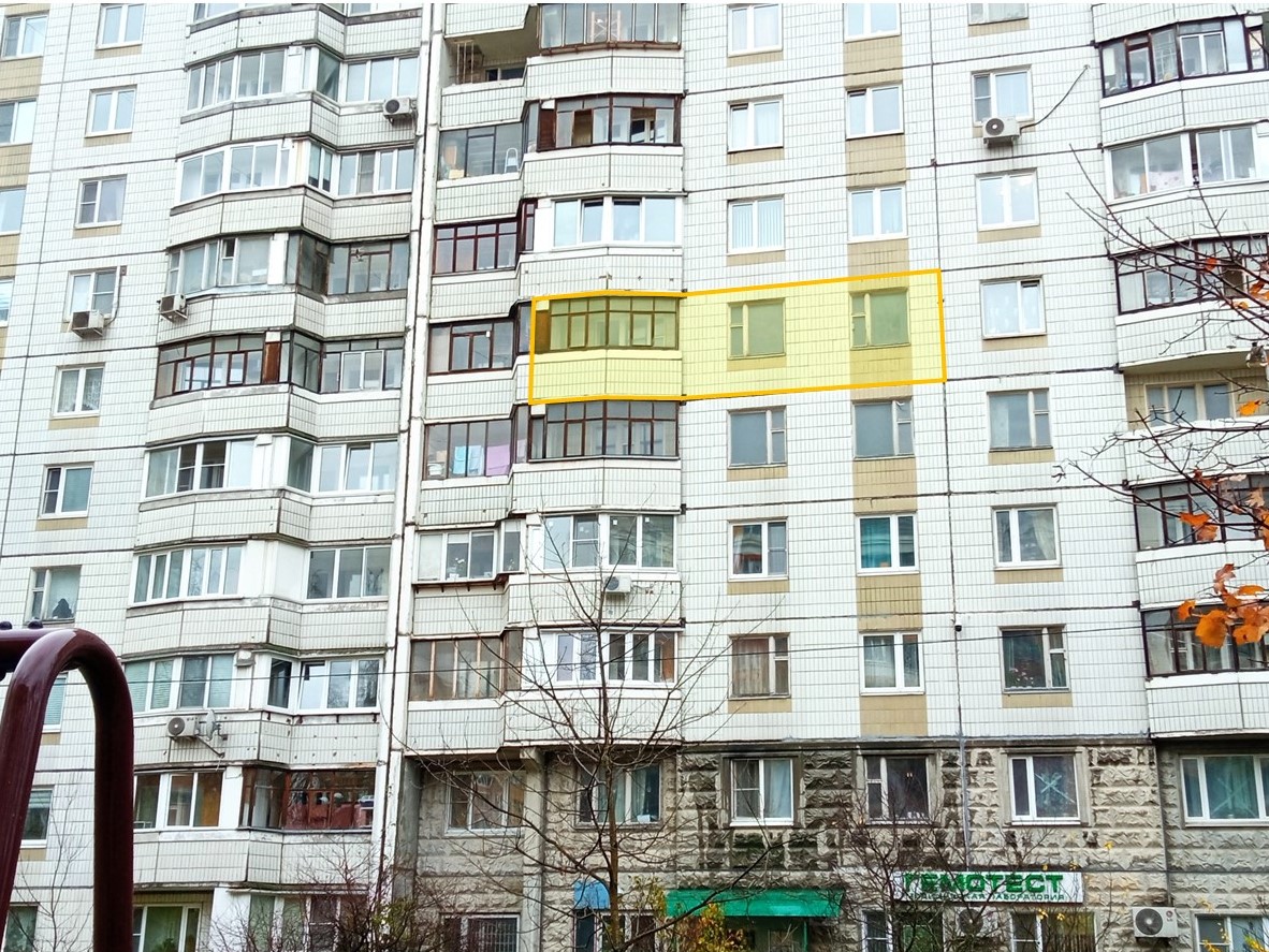 ГП16977167.Квартира.Фасад здания с выделенными окнами реализуемого объекта.jpg