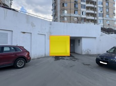 ГП16984491.Машино-место.Фасад здания с выделенными окнами реализуемого объекта.jpg
