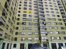 ГП17006686.Квартира.Фасад здания с выделенными окнами реализуемого объекта.jpg