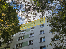 ГП17007331.Квартира.Фасад здания с выделенными окнами реализуемого объекта.png