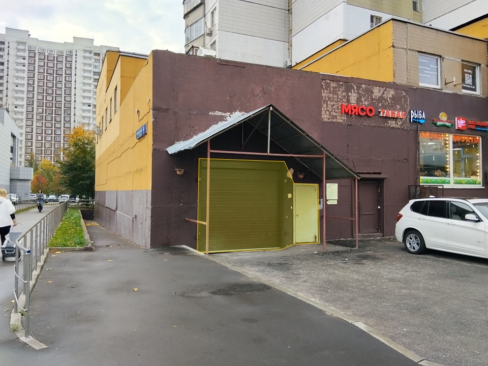 ГП17008140.Нежилое помещение.Фасад здания с выделенными окнами реализуемого объекта.jpg