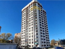 ГП17008063.Квартира.Фасад здания с выделенными окнами реализуемого объекта.jpg