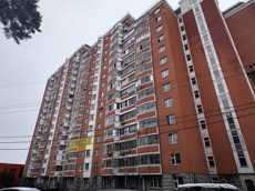 ГП16974753.Квартира.Фасад здания с выделенными окнами реализуемого объекта.jpg