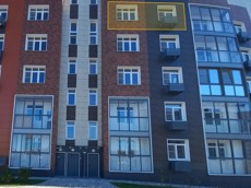 ГП17008069.Квартира.Фасад здания с выделенными окнами реализуемого объекта_2.jpg