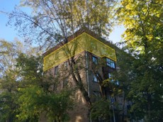 ГП17006111.Квартира.Фасад здания с выделенными окнами реализуемого объекта.jpg